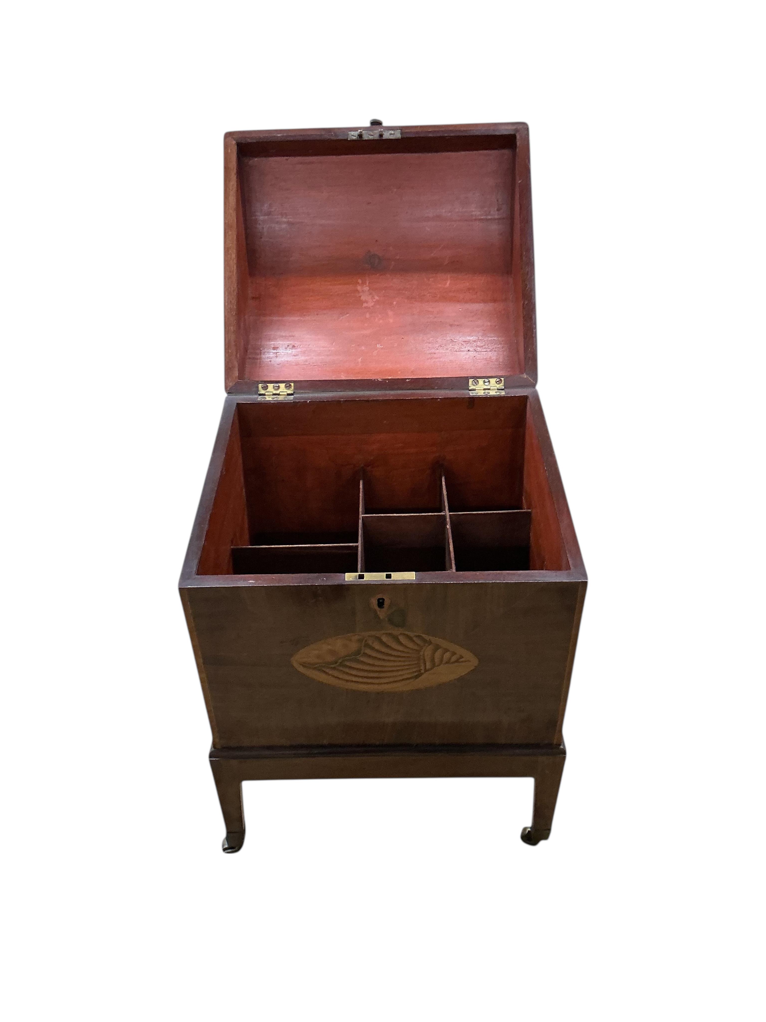 A George IV inlaid mahogany domed cellaret, width 42cm, depth 36cm, height 59cm